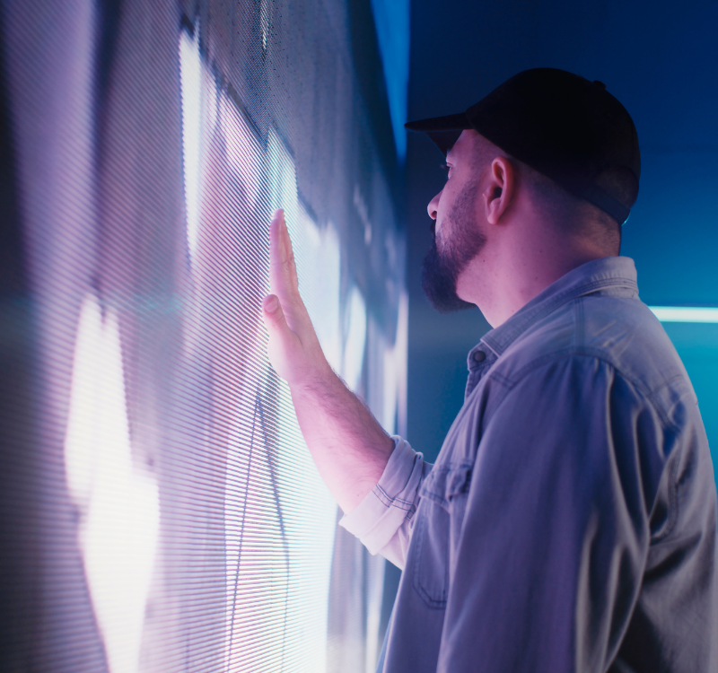 Man Touching LED Screen